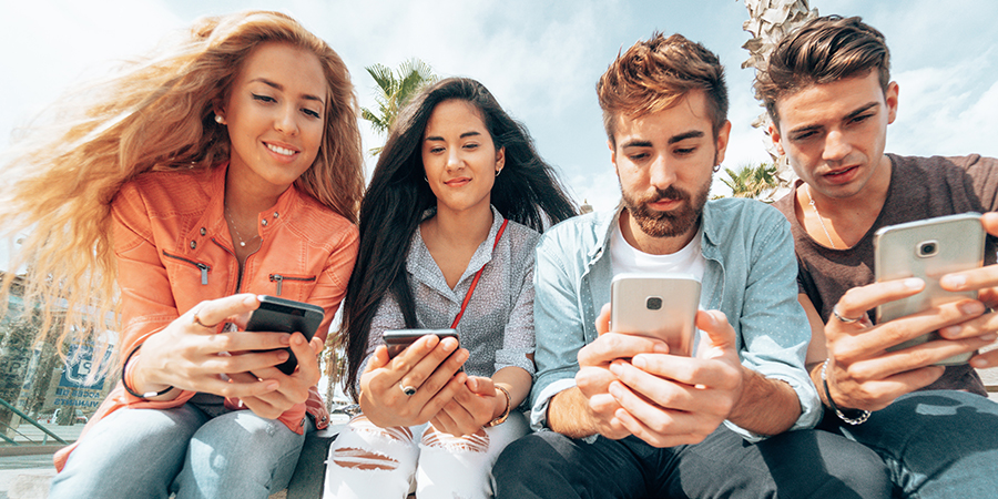 Group of friends addicted to social media